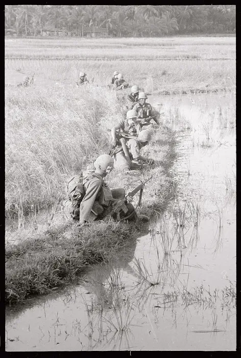 Framed Print : Soldiers Sitting in Rice Field Framed Print : Soldiers Sitting in Rice Field