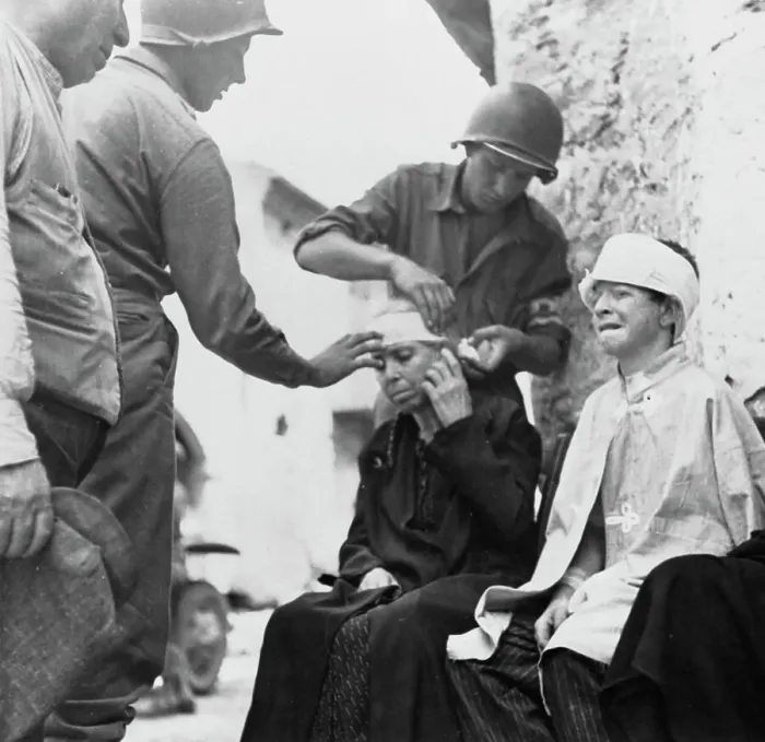 Framed Print : US Soldiers Treating Italian Civilians Framed Print : US Soldiers Treating Italian Civilians