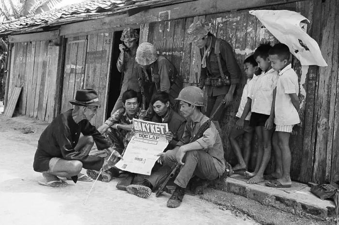 Framed Print : Soldiers and Villagers Read Paper Framed Print : Soldiers and Villagers Read Paper