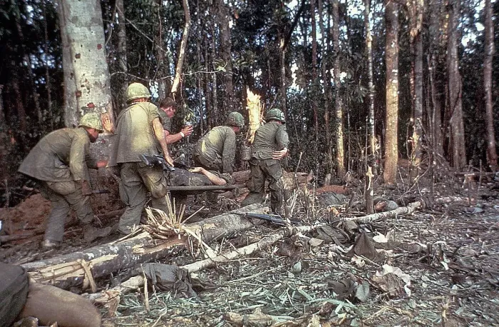 Framed Print : Soldiers W / Wounded Marine / Vietnam War Framed Print : Soldiers W / Wounded Marine / Vietnam War