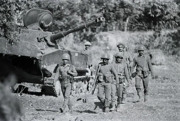 Framed Print : Soldiers Walk Past Destroyed Tank Framed Print : Soldiers Walk Past Destroyed Tank