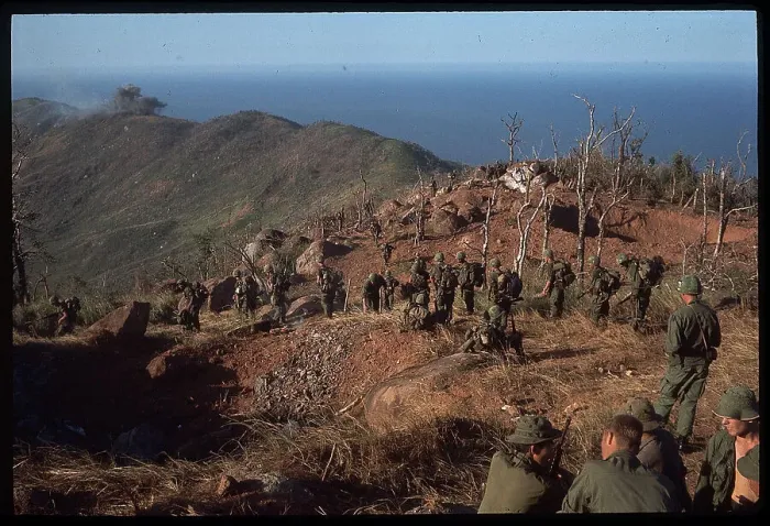 Framed Print : US Soldiers Walking in Line Along Hill Framed Print : US Soldiers Walking in Line Along Hill