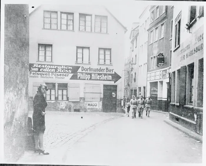 Framed Print : Soldiers Walking in Street Near Stores Framed Print : Soldiers Walking in Street Near Stores