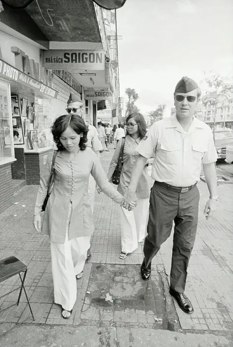 Framed Print : Two Soldiers Walking with Vietnamese Women Framed Print : Two Soldiers Walking with Vietnamese Women