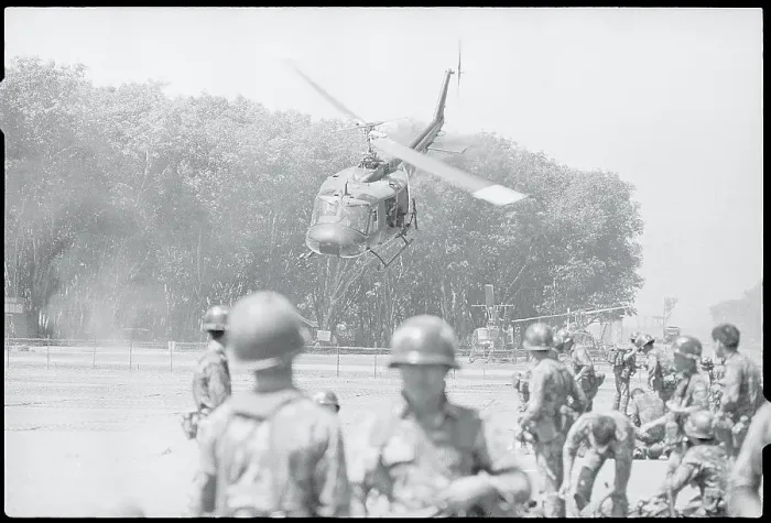 Framed Print : Soldiers Watching Helicopter Land Framed Print : Soldiers Watching Helicopter Land