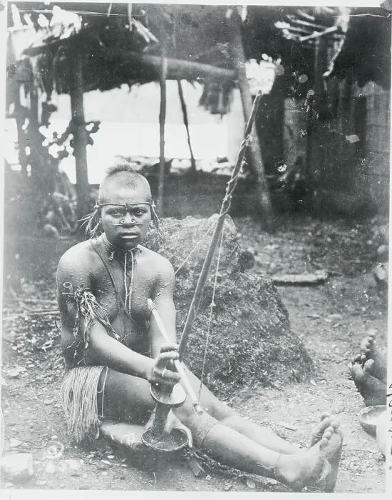 Framed Print : Solomon Islander Drilling Shells