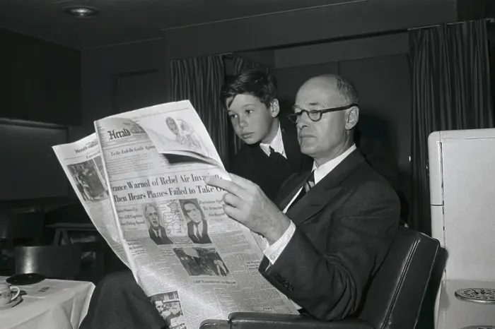 Framed Print : Son Reading Newspaper over George Kennan's Shoulder Framed Print : Son Reading Newspaper over George Kennan's Shoulder