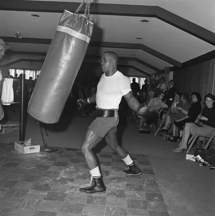 Framed Print : Sonny Liston With One Arm Ready to Punch Boxing Bag Framed Print : Sonny Liston With One Arm Ready to Punch Boxing Bag