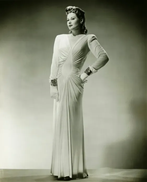 Framed Print : Sophisticated woman in evening gown posing in studio, (B&W), portrait Framed Print : Sophisticated woman in evening gown posing in studio, (B&W), portrait