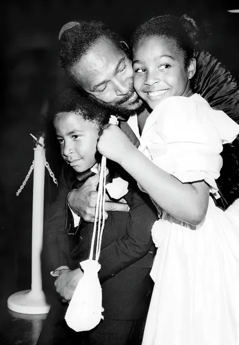 Framed Print : Soul Singer Hugging His Children Framed Print : Soul Singer Hugging His Children