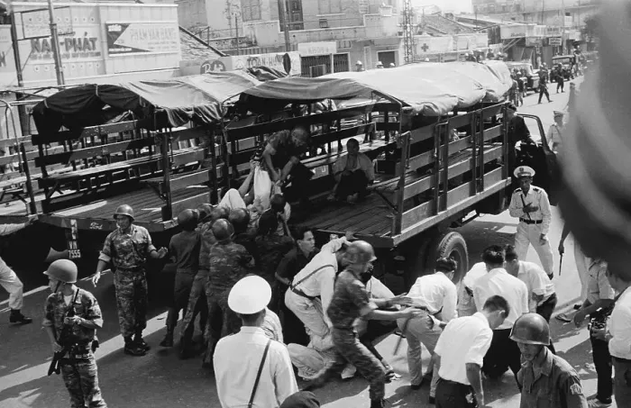 Framed Print : South Vietnamese Police Placings Monks in Trucks Framed Print : South Vietnamese Police Placings Monks in Trucks