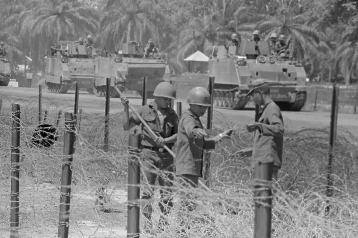 Framed Print : South Vietnamese Soldiers on Road Stringing Barbed Wire