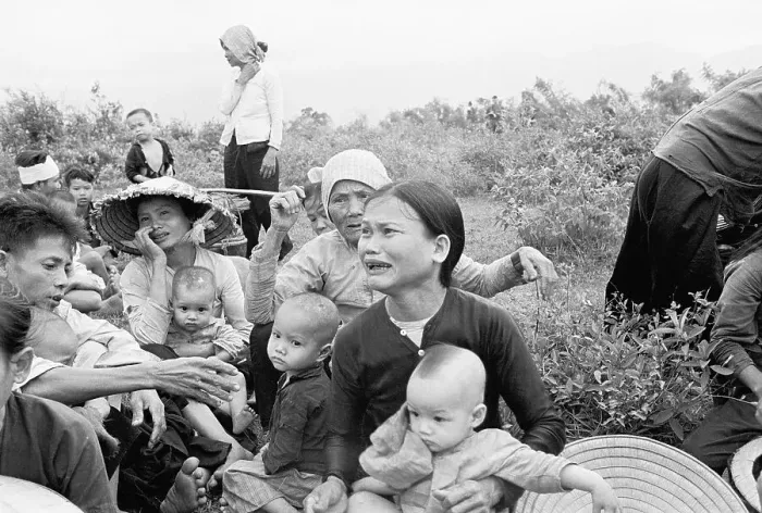 Framed Print : South Vietnamese Villagers Wait for Evacuation During Vietnam War Framed Print : South Vietnamese Villagers Wait for Evacuation During Vietnam War