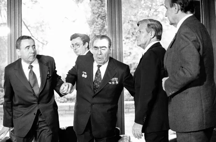 Framed Print : Soviet and West German Leaders Aid President Leonid Brezhnev After a Photo Session Framed Print : Soviet and West German Leaders Aid President Leonid Brezhnev After a Photo Session