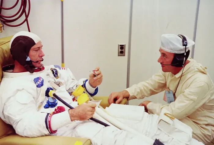 Framed Print : Space Technician Conversing with Astronaut Edgar D. Mitchell