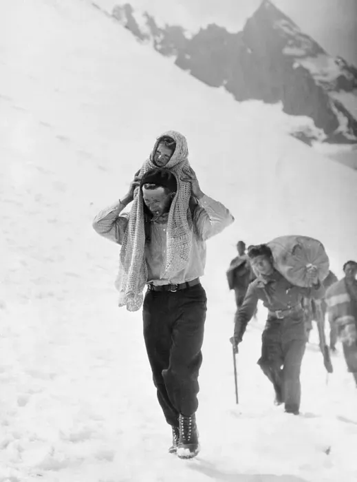 Framed Print : Spanish Father Carrying His Child with Fellow Refugees Behind Framed Print : Spanish Father Carrying His Child with Fellow Refugees Behind