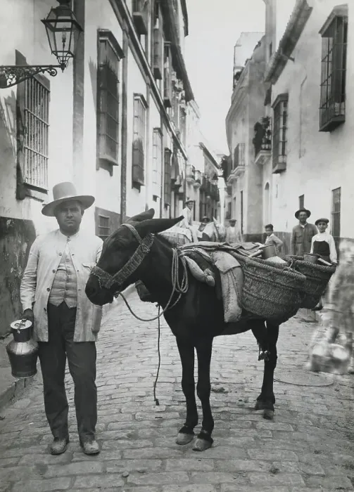 Framed Print : Spanish Milk Man Posing with His Donkey in the Street Framed Print : Spanish Milk Man Posing with His Donkey in the Street