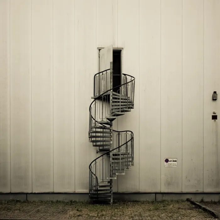 Framed Print : Spiral staircase with open door Framed Print : Spiral staircase with open door