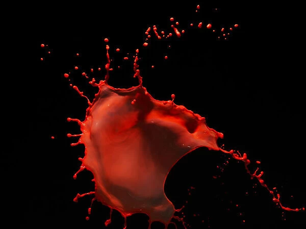 Splash. Red splash on black background