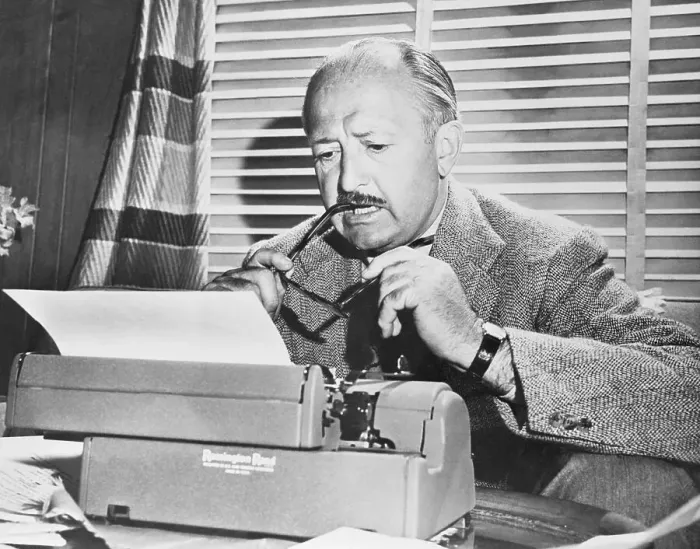 Framed Print : Sports Columnist Dan Parker Working at Typewriter Framed Print : Sports Columnist Dan Parker Working at Typewriter