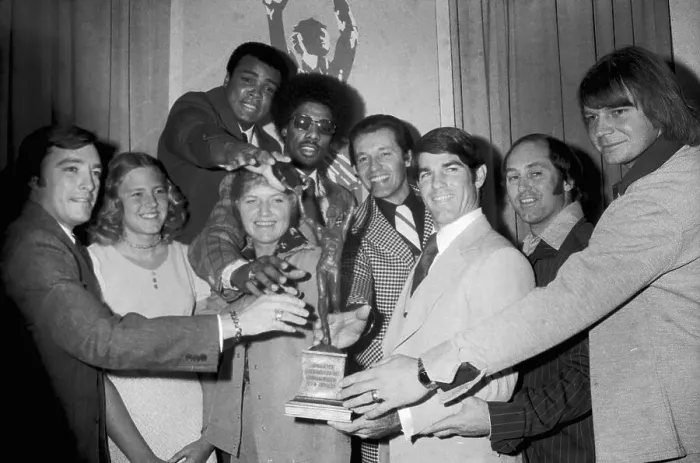 Framed Print : Sports Figures Reaching for Award Framed Print : Sports Figures Reaching for Award