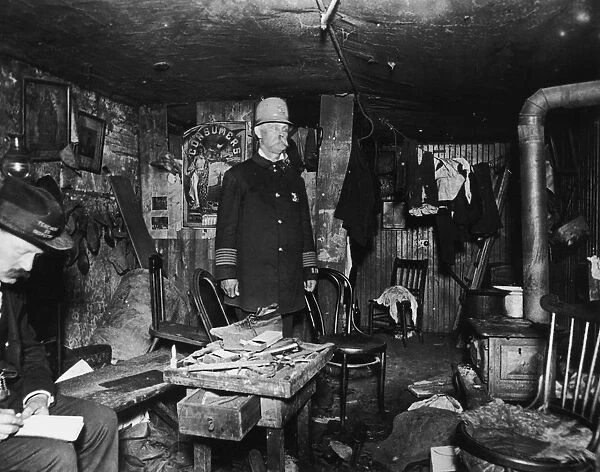 Squalor In New York. Officials inspecting a tenement in New York City, 1900