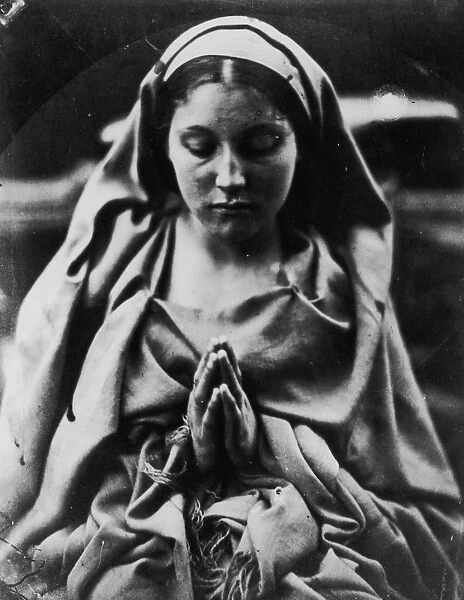 St Agnes. circa 1870: A woman posing as St Agnes