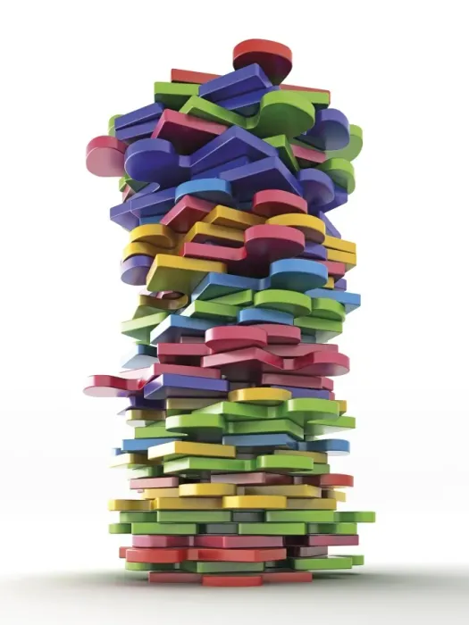 Framed Print : Stacked colorful pieces of a puzzle Framed Print : Stacked colorful pieces of a puzzle