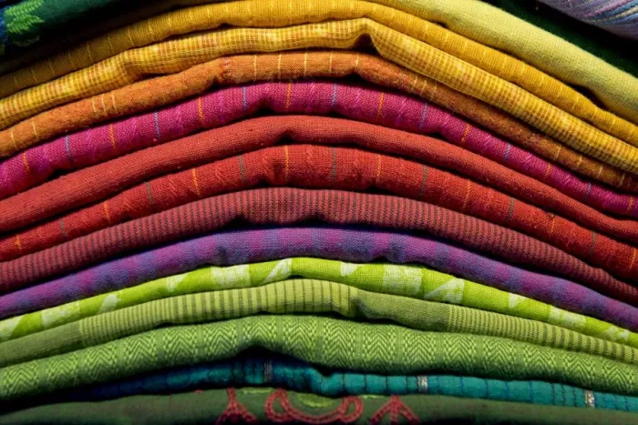 Framed Print : Stacked colourful towels, Kerala, India Framed Print : Stacked colourful towels, Kerala, India