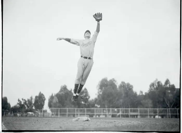 Framed Print : Stan Hack Leaping Through the Air Framed Print : Stan Hack Leaping Through the Air