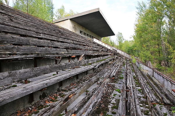 Empty stands of abandoned stadium in Pripyat city near Chernobyl
