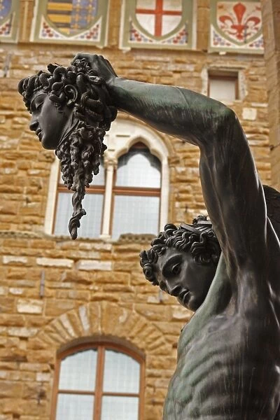 Statue Of Perseus Holding The Head Of Medusa Beside The Palazzo Vecchio
