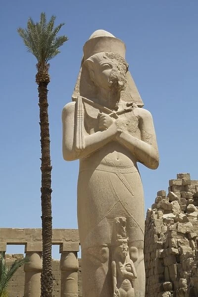 Statue of Ramses II with his daughter Benta-Anta, Forecourt, Karnak Temple Complex