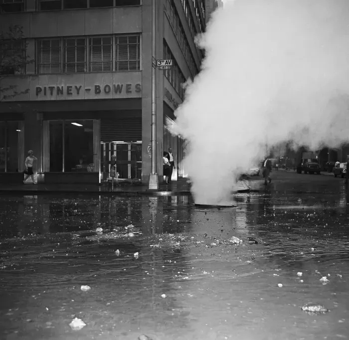 Framed Print : Steam Pours From Sewer On Flooded Street Framed Print : Steam Pours From Sewer On Flooded Street