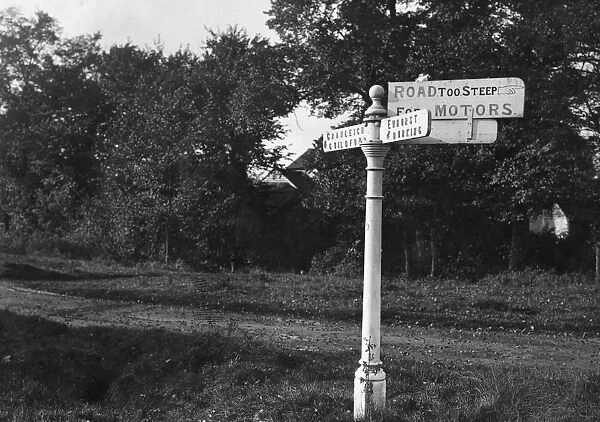 Too Steep. 11th November 1913: A sign indicating that the road is too steep for motors