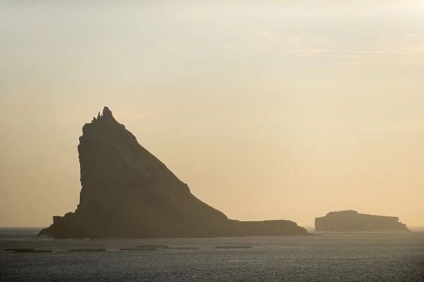 Steep towering rocks off Vagar, Vagar, Faroe Islands, Denmark