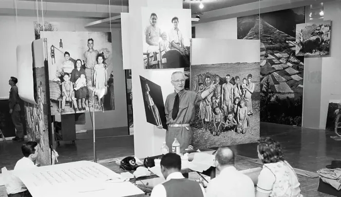 Framed Print : Steichen Installing Photographic Exhibition Framed Print : Steichen Installing Photographic Exhibition
