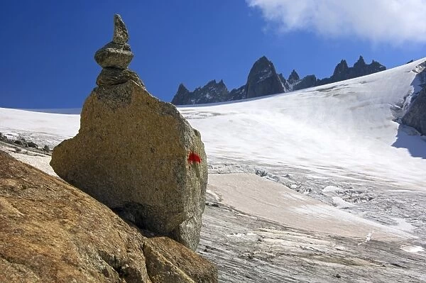 Steinmaennl, cairn made of stacked stones as a signpost on the edge of Orny Glacier in the Valais Alps, Switzerland, Europe