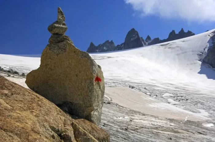 Framed Print : Steinmaennl, cairn made of stacked stones as a signpost on the edge of Orny Glacier in the Valais Alps, Switzerland, Europe Framed Print : Steinmaennl, cairn made of stacked stones as a signpost on the edge of Orny Glacier in the Valais Alps, Switzerland, Europe
