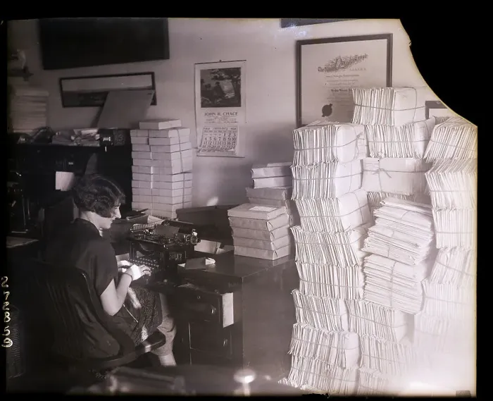 Framed Print : Stenographer Working at Cluttered Desk