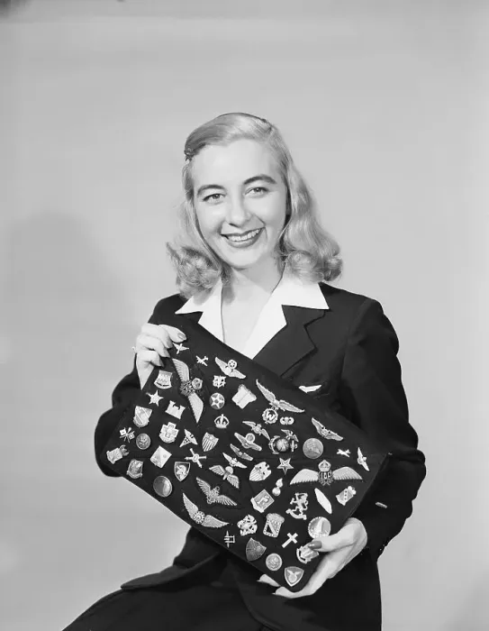 Framed Print : Sterardess With Her Collection Of Pins Framed Print : Sterardess With Her Collection Of Pins