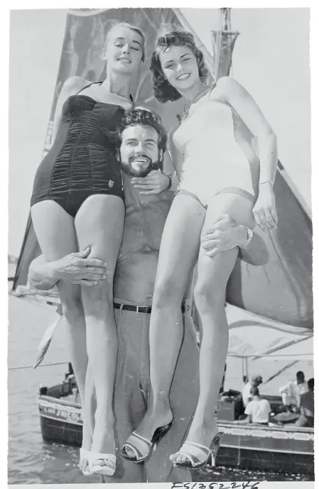 Framed Print : Steve Reeves Posing with Beauty Contestant Winners on Shore
