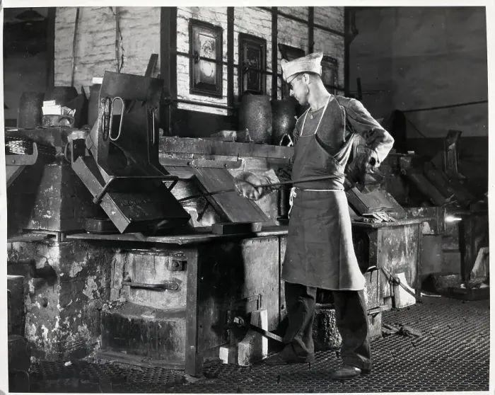 Framed Print : Stirring Molten Metal Before Pouring Framed Print : Stirring Molten Metal Before Pouring