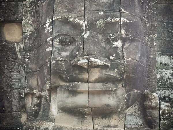 Stone Craft of Smile face at Bayon temple, the Temple of a Thousand Faces at Angkor in siem reap, Cambodia
