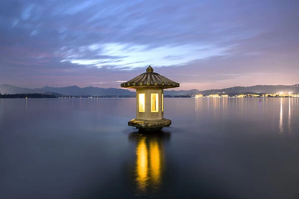 A stone lantern on the West Lake, Hangzhou
