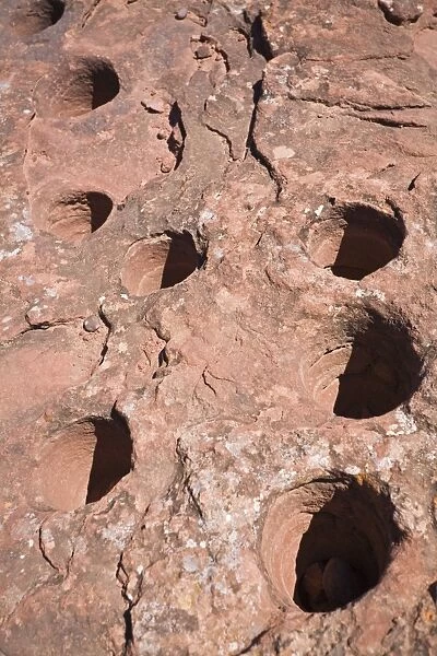 Stone panel with holes from the original inhabitants in the national park, Parque Nacional Talampaya, Argentina, South America