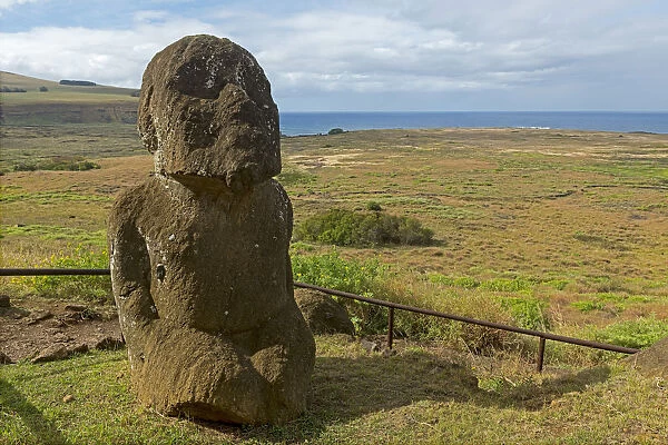 Stone sculpture in front of the Pacific Ocean, Easter Island, Chile