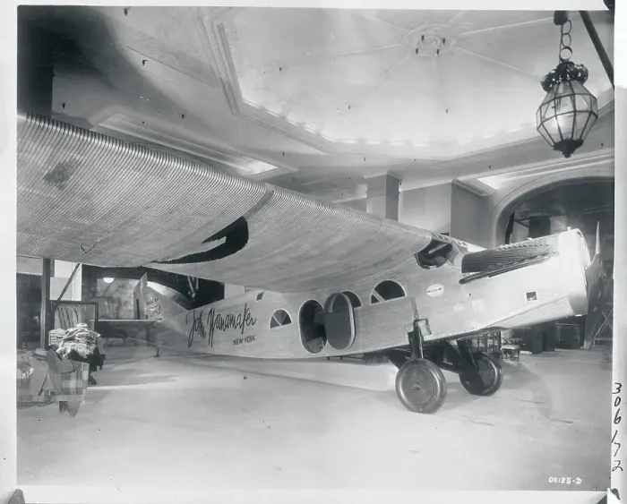 Framed Print : Store Displaying Plane for Sale