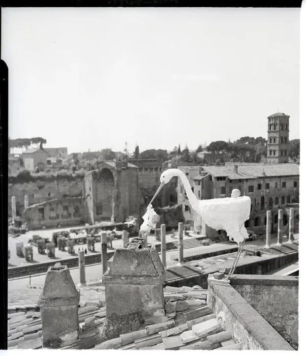 Framed Print : Stork Carrying Baby On Rooftop Framed Print : Stork Carrying Baby On Rooftop