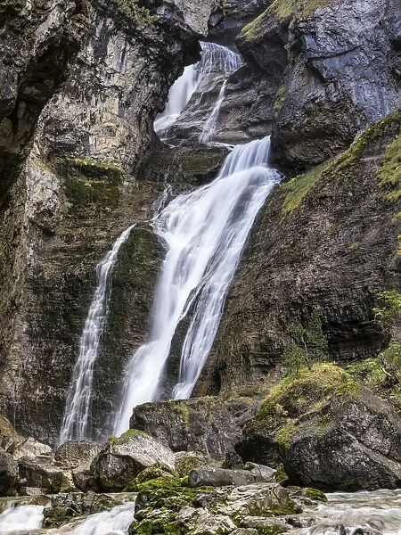 Strait waterfall in the Pyrenees in autumn, Ordesa